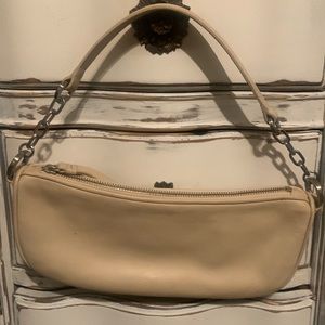 Ann Taylor calf leather shoulder bag that has a strap to carry as a wristlet